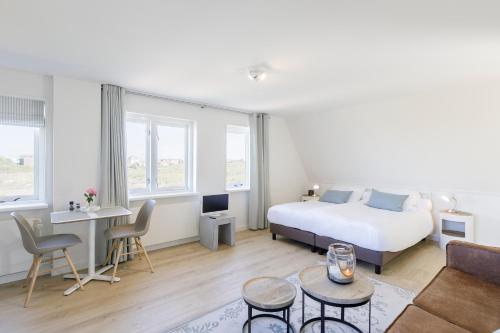 Кровать или кровати в номере Villa Parnassia