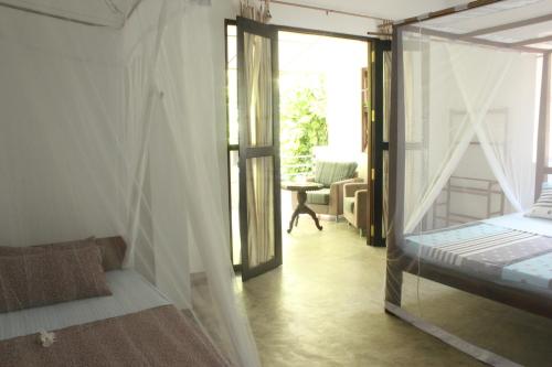 Ένα ή περισσότερα κρεβάτια σε δωμάτιο στο Dionis Villa