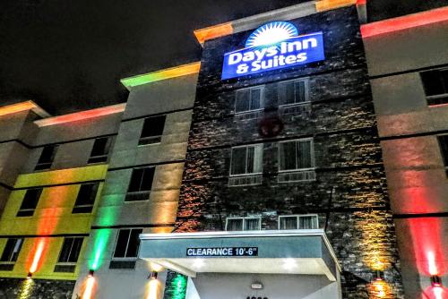 a building with a sign that reads days inn and suites at Days Inn & Suites by Wyndham Lubbock Medical Center in Lubbock