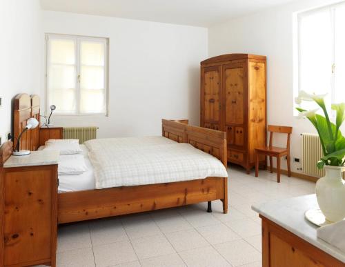 מיטה או מיטות בחדר ב-Casa Sandra Bertolini