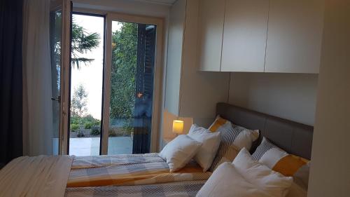 Кровать или кровати в номере Apartments Villa Kondres