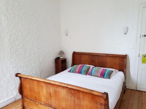 Postel nebo postele na pokoji v ubytování Hotel Restaurant Pavillon Bleu