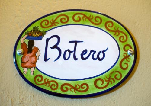 a sign with the word bibes on a wall at Casa Calderoni in San Miguel de Allende