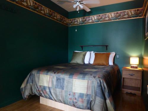 Giường trong phòng chung tại Motel de l'Anse a l'Eau