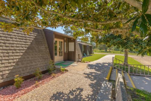 a house with a pathway leading to the front door at Colorado River RV Campground in Columbus