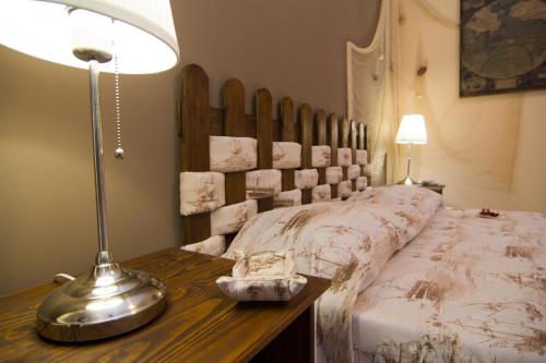 A bed or beds in a room at B&B Tifeo