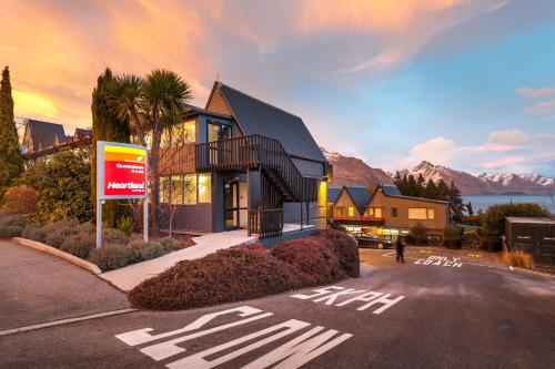 a house on the side of a street at Heartland Hotel Queenstown in Queenstown