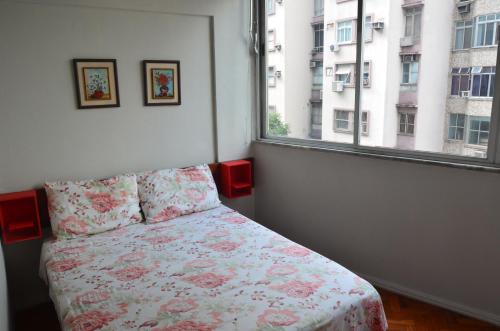 Postel nebo postele na pokoji v ubytování Copacabana Etrusco Apartment
