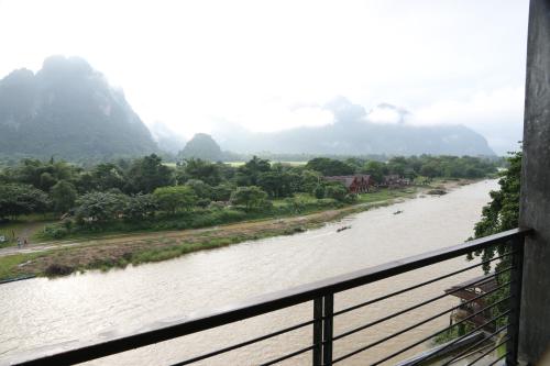 a view of a river from a bridge at Inthira Vangvieng in Vang Vieng