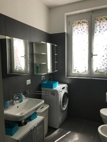 Ванная комната в Orchidea Apartment