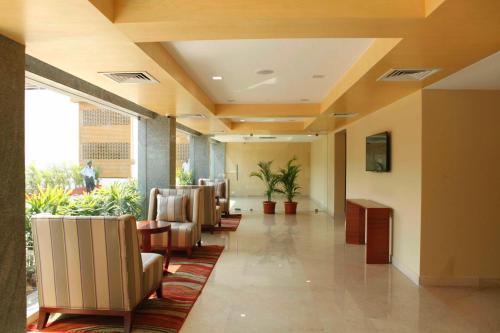 Zona de estar de Lemon Tree Hotel Shimona Chennai