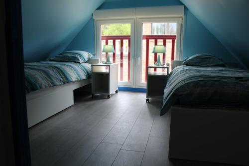 Llit o llits en una habitació de La Grange Du Festel