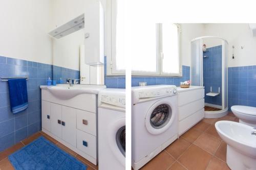 シラクーサにあるCasa Vacanza Arenellaのバスルーム(洗濯機、シンク付)