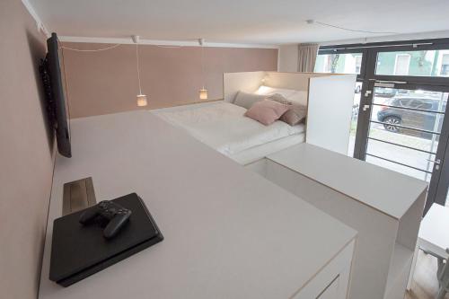 Modern Design Apartmentにあるベッド