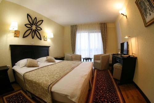 Postel nebo postele na pokoji v ubytování Casa Bata