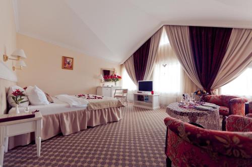 A bed or beds in a room at Chekhov hotel by Original Hotels