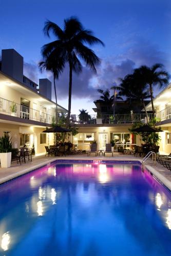 a large swimming pool in front of a building at The Grand Resort and Spa & Worthington All Male in Fort Lauderdale