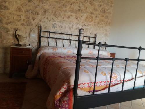 a bedroom with a bed in a room at Cominium Benessere in Alvito