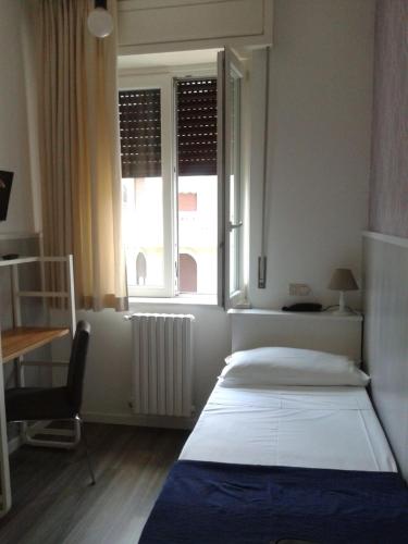 Postel nebo postele na pokoji v ubytování Hotel Malta