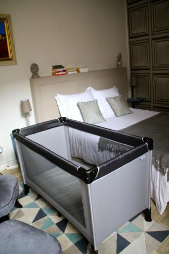 Кровать или кровати в номере Une Chambre en Ville