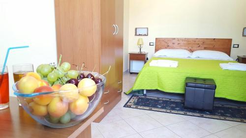 Postel nebo postele na pokoji v ubytování Camere Con Terrazzino