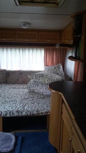 Postel nebo postele na pokoji v ubytování Eco Resort Nad Karpatamy