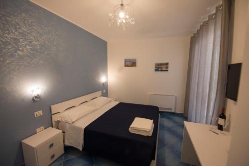 Letto o letti in una camera di Residenza Porta Romana