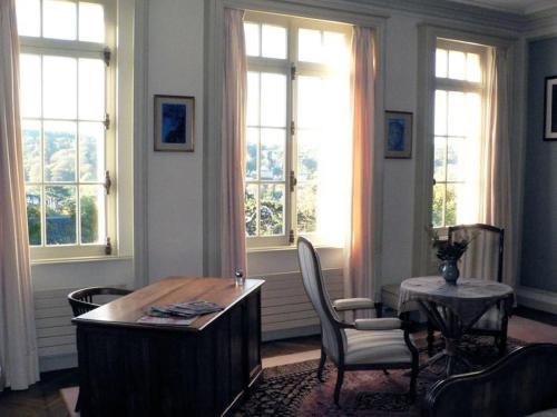 Μια τηλεόραση ή/και κέντρο ψυχαγωγίας στο Chambres d'Hôtes les Charmettes