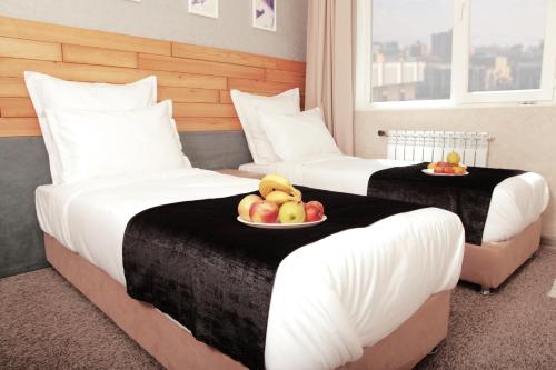 Ліжко або ліжка в номері Small Hotel
