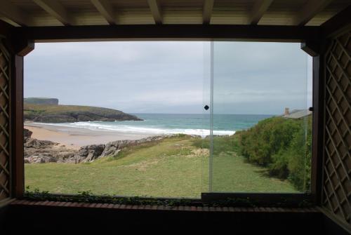 a window view of the ocean from a beach at La Lagartija Adults Only in Ajo