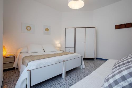 Letto o letti in una camera di Angelina Apartments Amalfi Coast