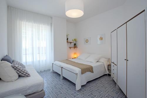 Letto o letti in una camera di Angelina Apartments Amalfi Coast