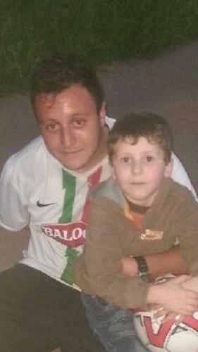 a man and a young boy posing for a picture at Hotel Green castellani in Vicenza