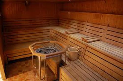an empty sauna with a table in the middle at Monte Carlo Hotel in Alanya