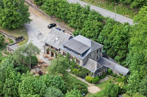 an aerial view of a house with a roof at Auberge Au Naturel des Ardennes in Rochehaut