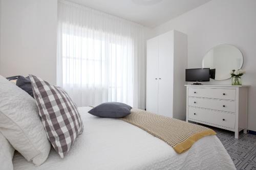 Letto o letti in una camera di Angelina Apartments Amalfi Coast