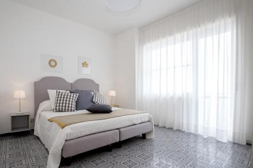 Letto o letti in una camera di Angelina Apartments Amalfi Coast