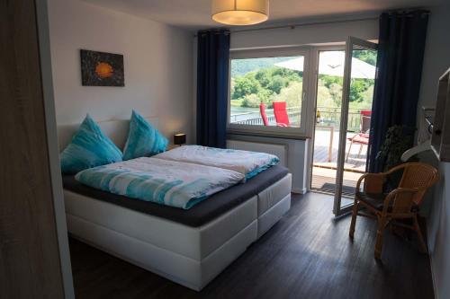 Postel nebo postele na pokoji v ubytování Ferienwohnung Sonnendeck