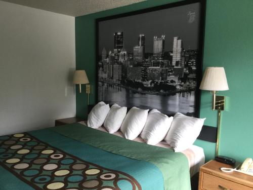 Super 8 by Wyndham New Stantonにあるベッド