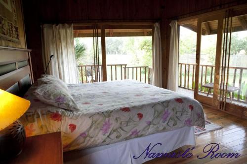 
Cama o camas de una habitación en Mapuyampay Lodge Gastronómico
