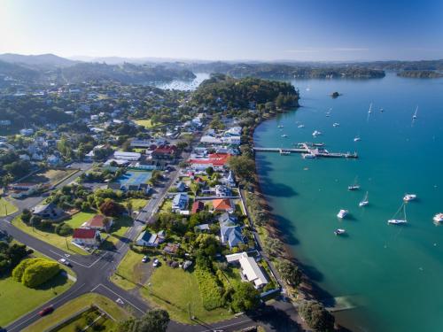 an aerial view of a harbor with boats in the water at Commodores Lodge in Russell