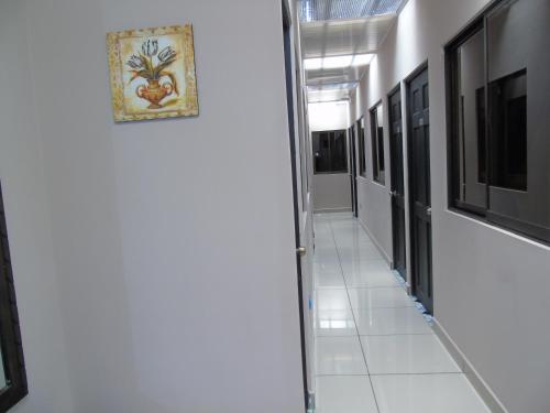 TV a/nebo společenská místnost v ubytování Hotel El Descanso