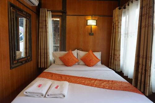 Кровать или кровати в номере Mitaree Hotel 1