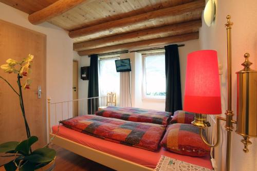 Postel nebo postele na pokoji v ubytování Osteria Ritrovo dei Passeggeri