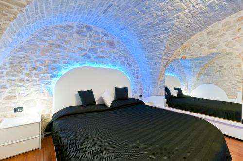 Postel nebo postele na pokoji v ubytování B&B La Dimora