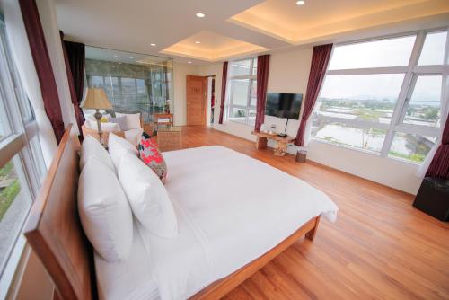 Ein Bett oder Betten in einem Zimmer der Unterkunft Dreams Come True B&B