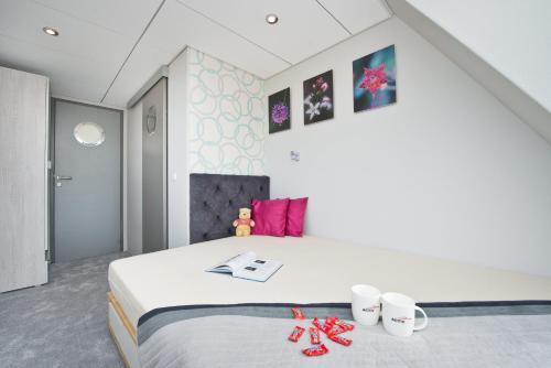 Posteľ alebo postele v izbe v ubytovaní Houseboat