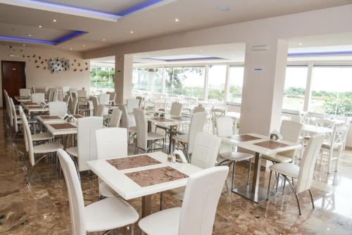 
A restaurant or other place to eat at Vallian Village Hotel
