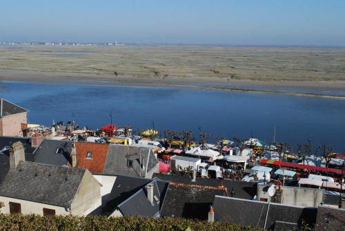 an aerial view of a town next to a body of water at Gite des Gargouilles in Saint-Valery-sur-Somme