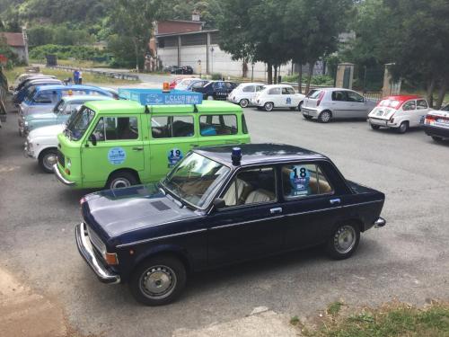 a group of cars parked in a parking lot at Albergo Ristorante Turchino in Campo Ligure